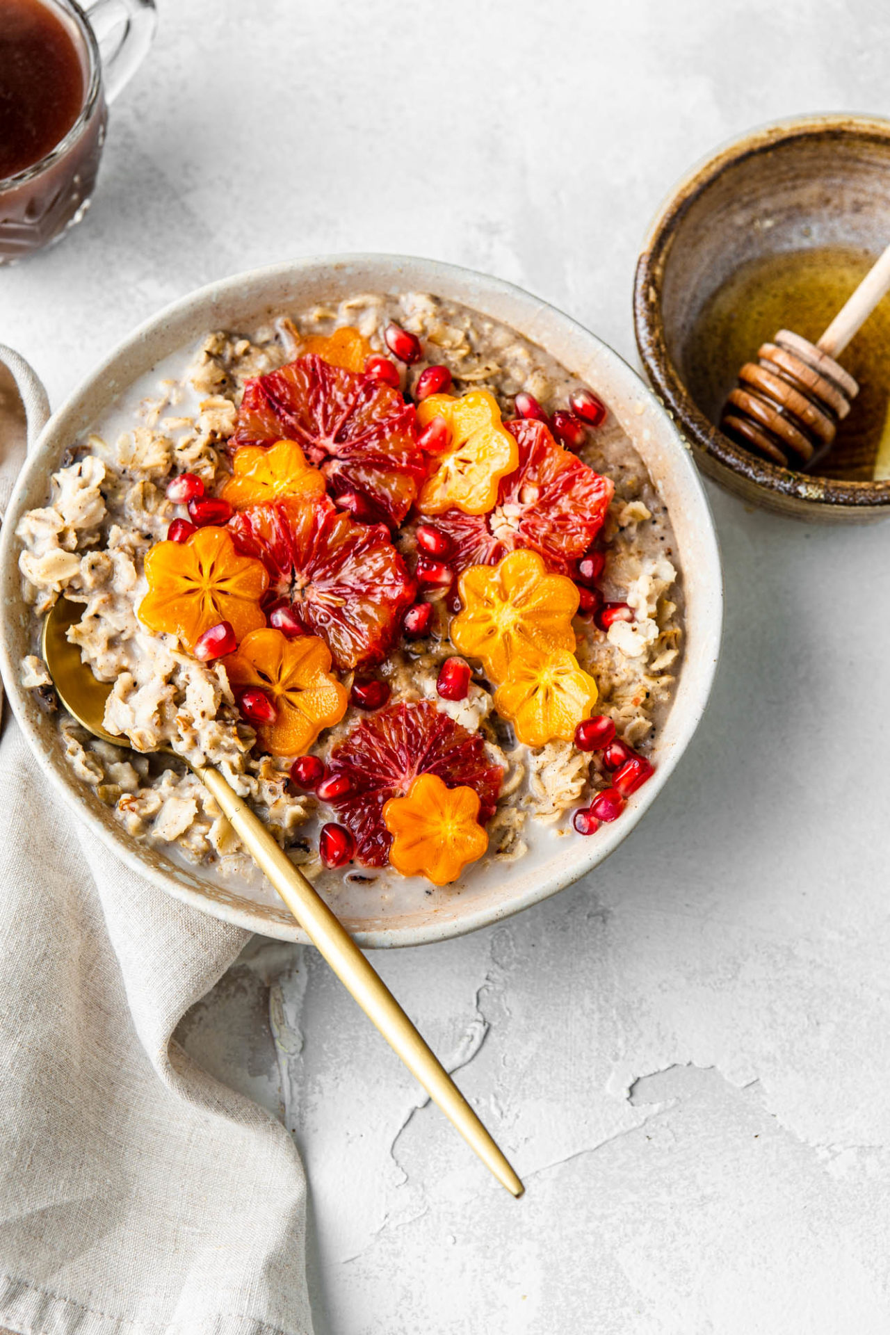 oatmeal with blood orange permission and pomegranate seeds photography