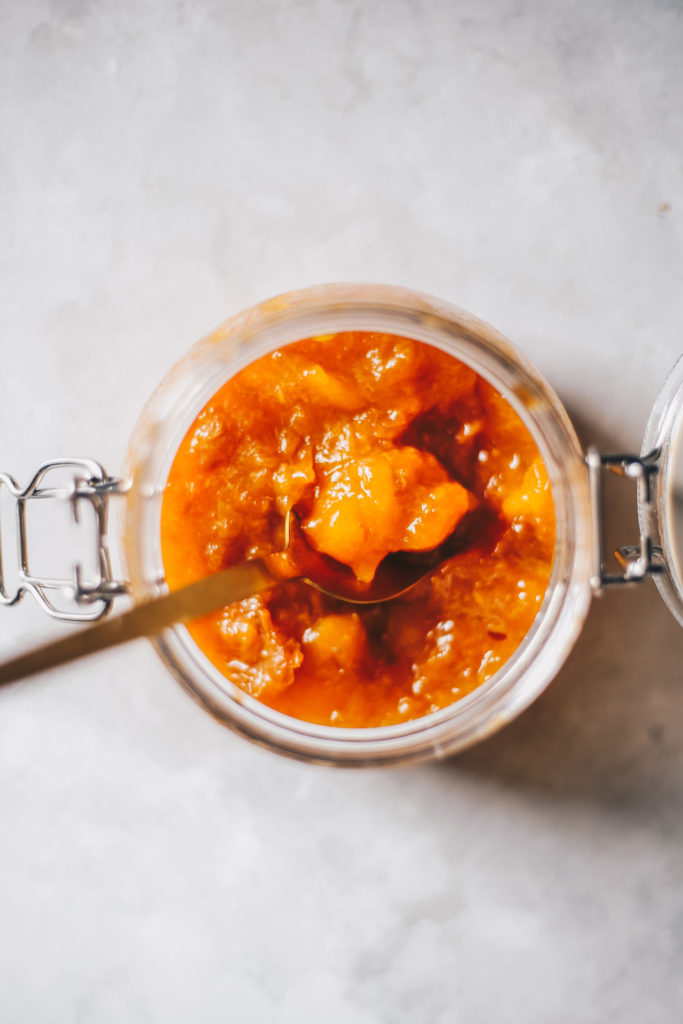 homemade peach jam in a jar photography