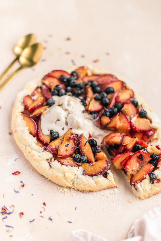 Gluten-Free Plum and Blueberry Galette with ice cream photography