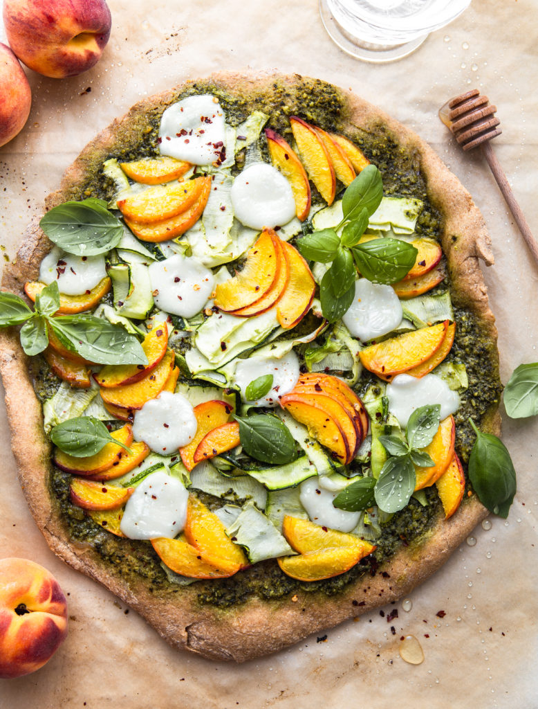 Whole Wheat Kale Pesto Pizza with Peaches and Zucchini and honey drizzle