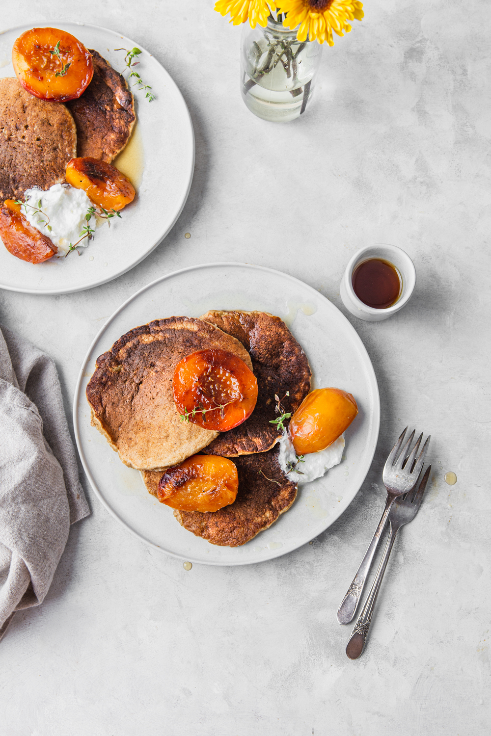 oatmeal pancakes breakfast spread with peaches and cream
