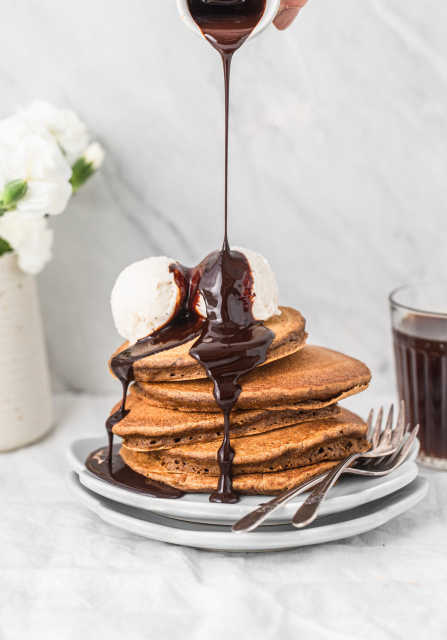 Coffee pancakes stack with mocha syrup drizzle pour shot