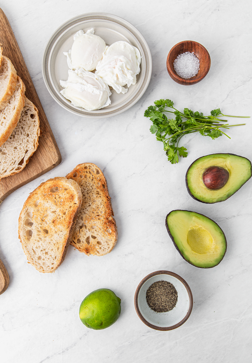 Avocado Sourdough Toasts with poached eggs ingredients photography