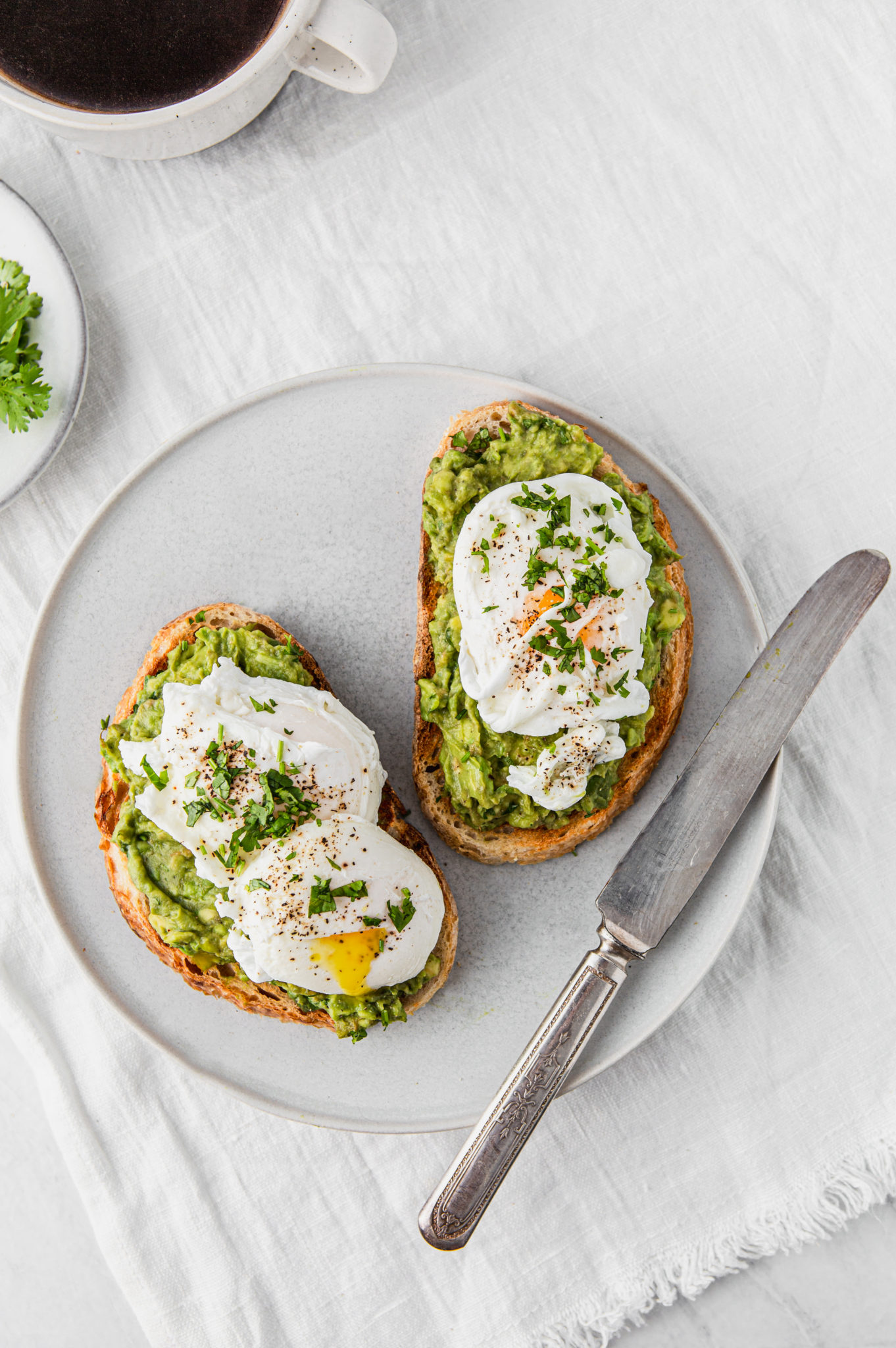 Avocado Sourdough Toasts with poached eggs photography