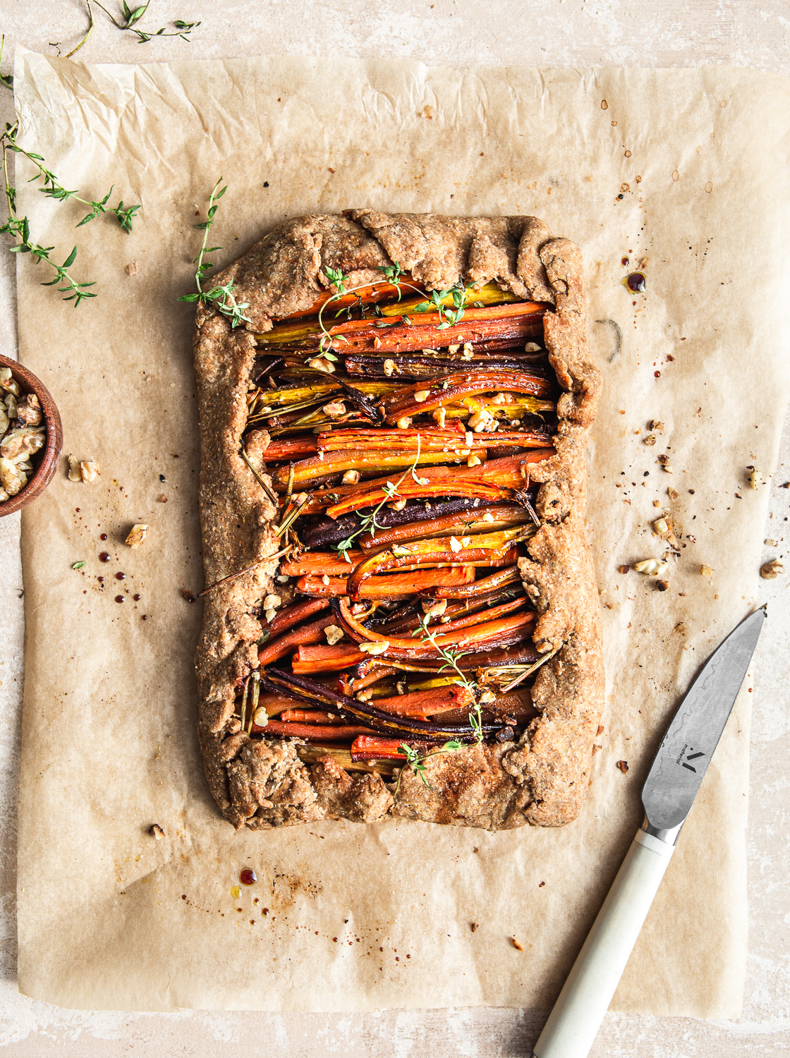 Roasted Carrot Galette with thyme and walnuts food photography