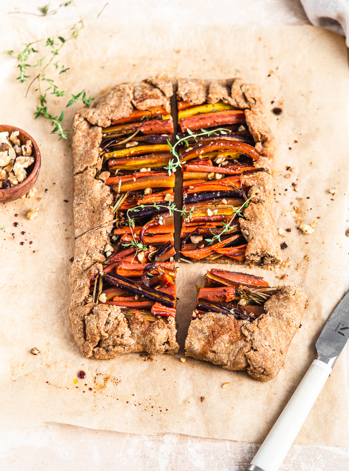 Roasted Carrot Galette with thyme and walnuts food photography