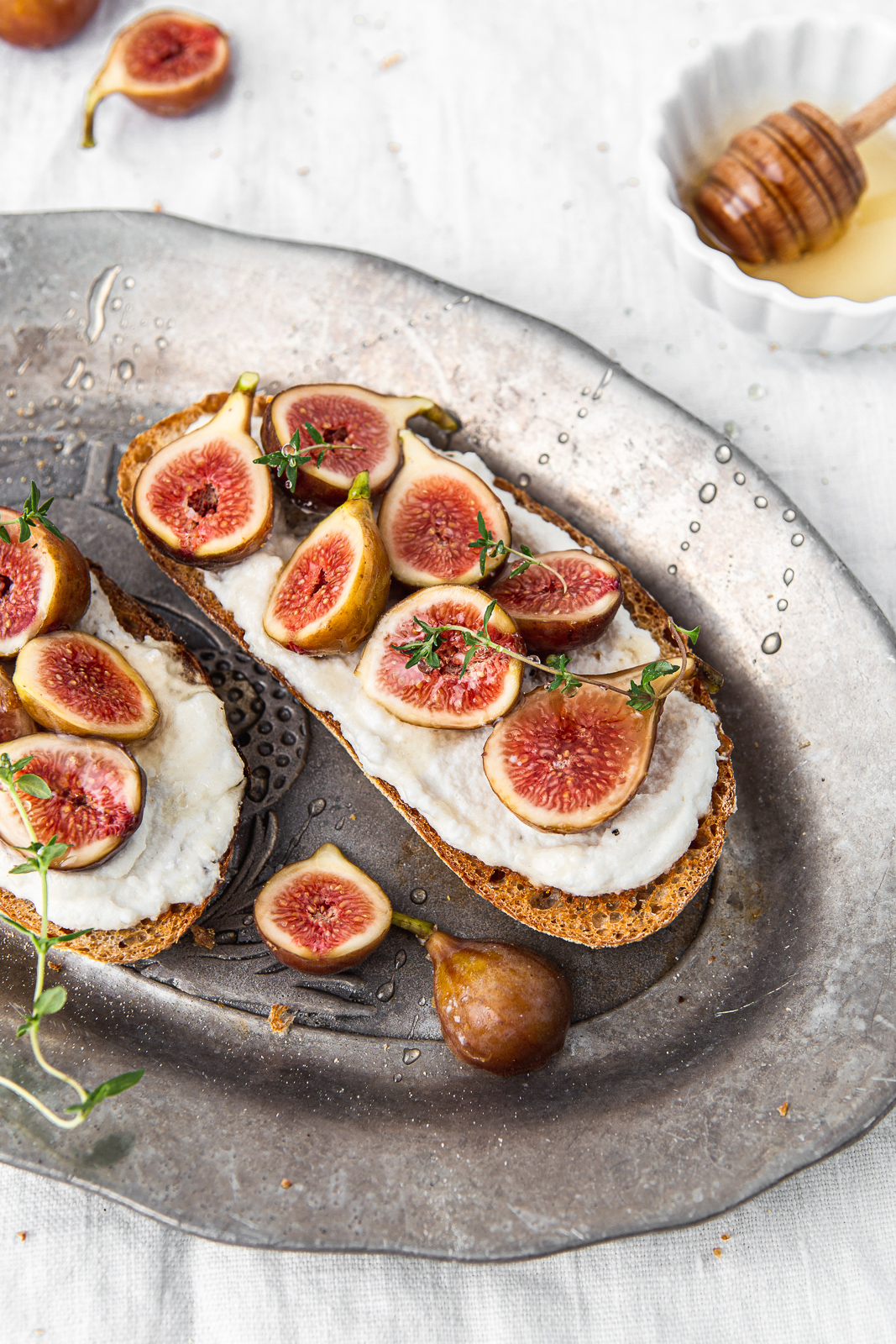 fig toasts with dairy free cream cheese and drizzle of honey