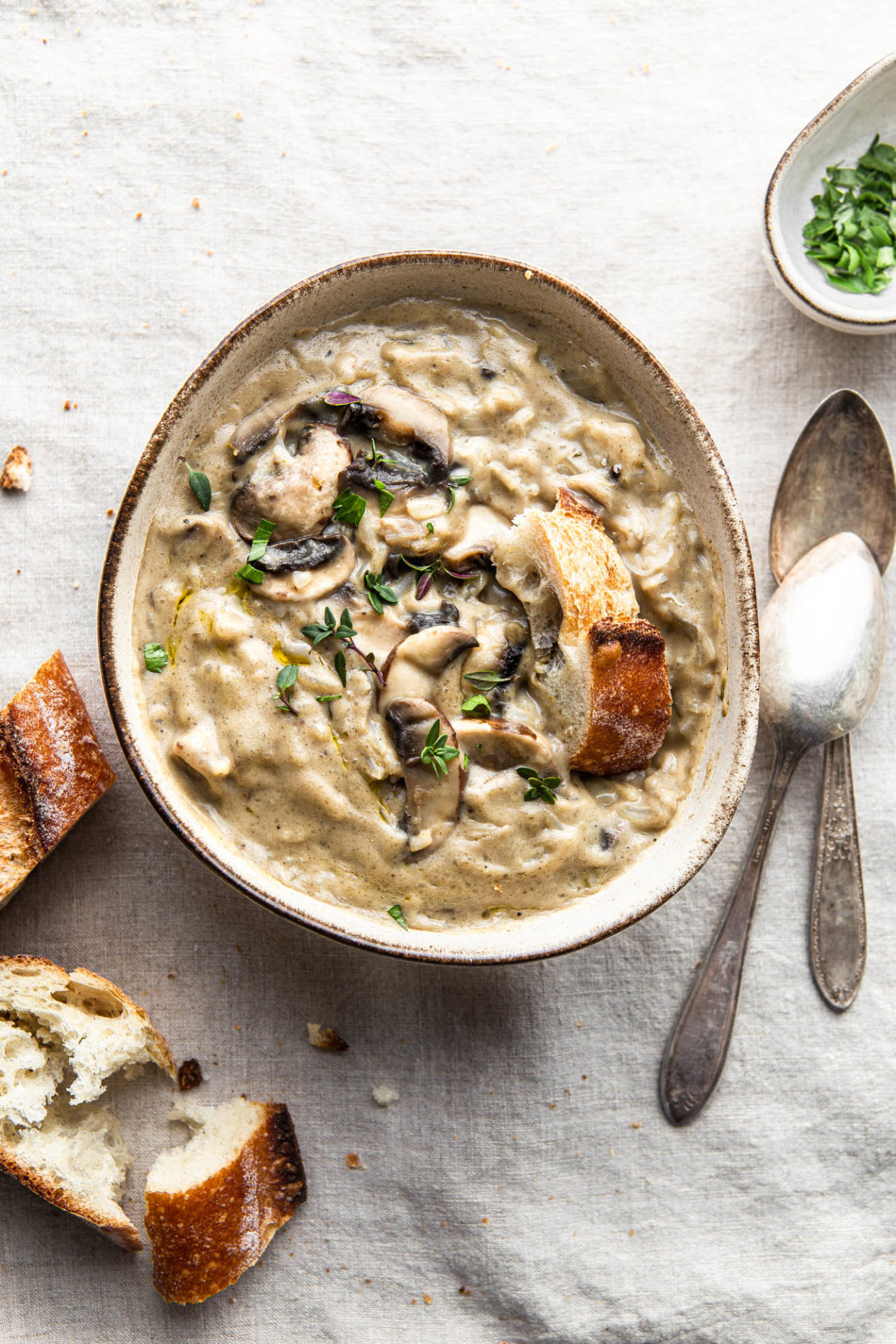 dairy free Cream Of Mushroom Soup with french baguette food photography