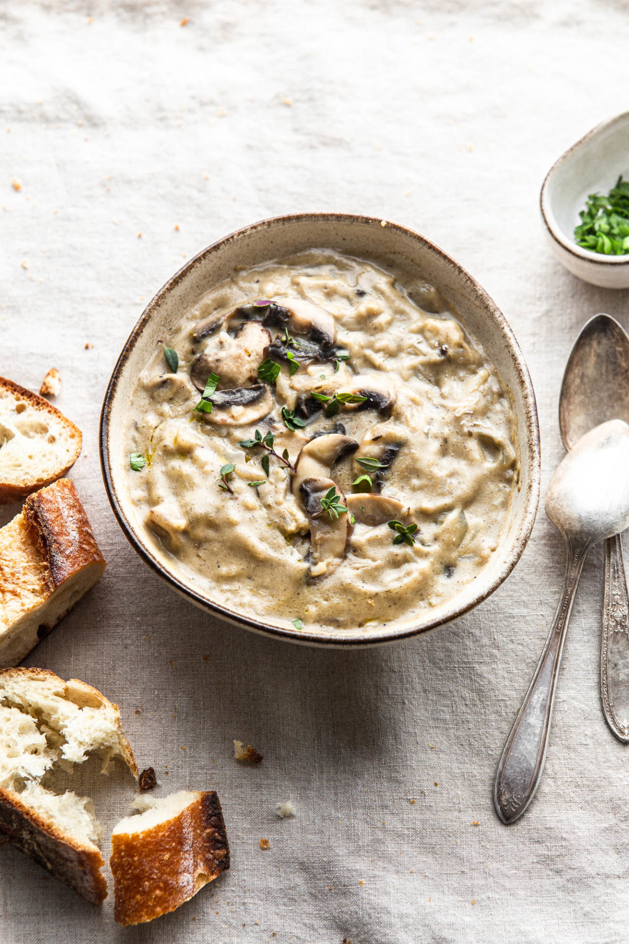 dairy free Cream Of Mushroom Soup with french baguette food photography