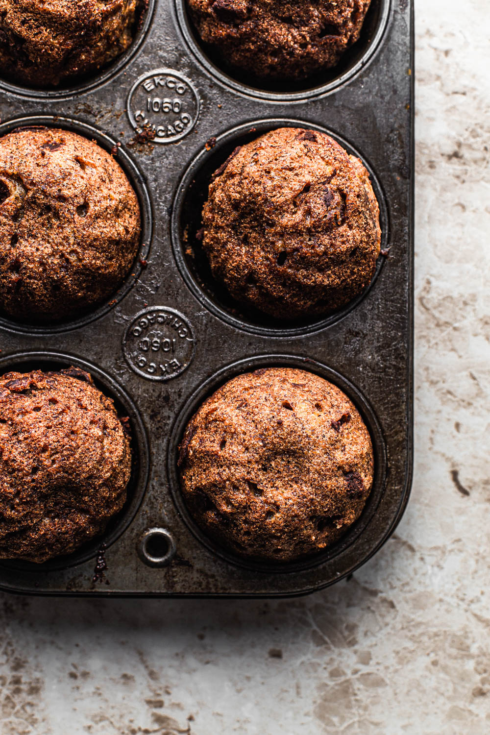 banana Chocolate Chip Muffins in a vintage muffin pan food photography