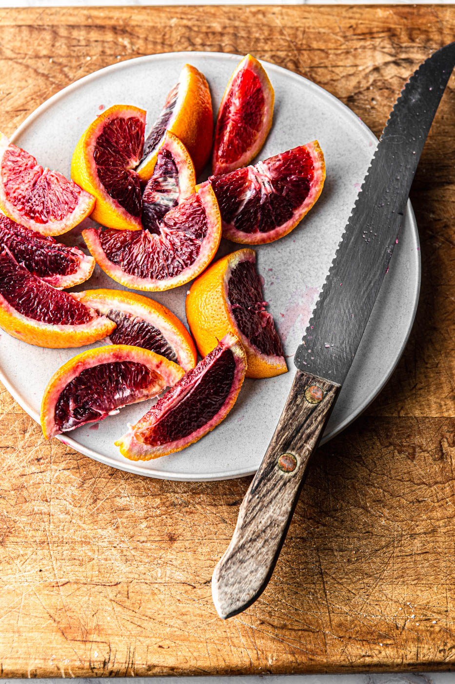 blood oranges cut in wedges food photography