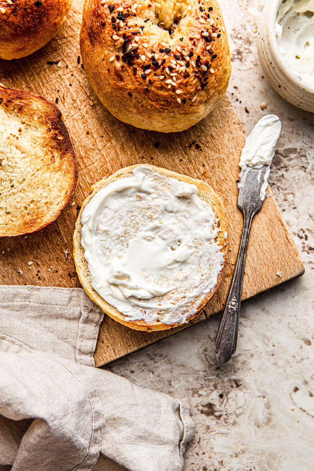 homemade everything bagels with cream cheese food photography