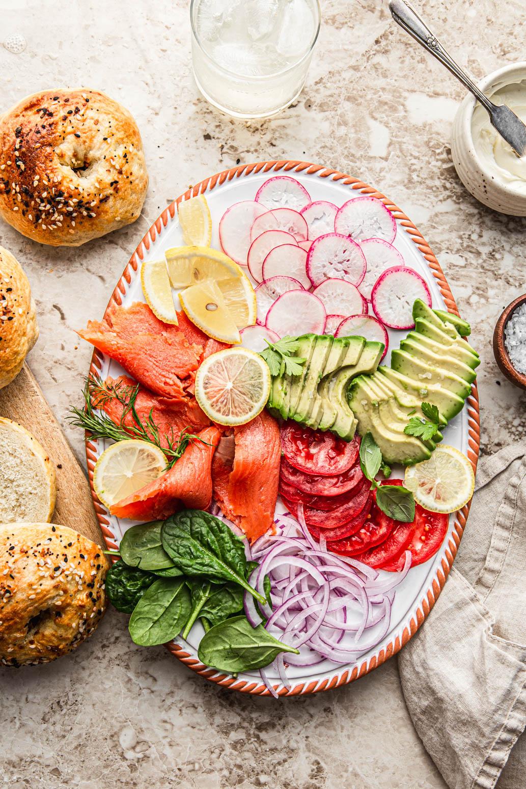 bagel bar platter with smoked salmon homemade bagels avocado photography
